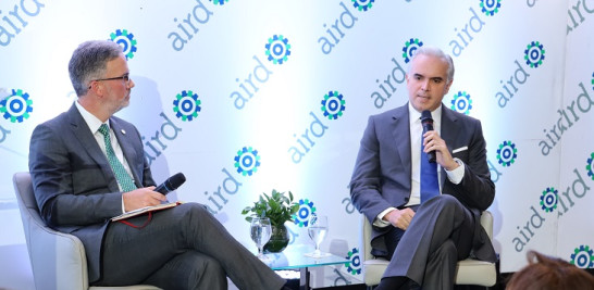 Mario Pujols vicepresidete ejecutivo AIRD junto a ministro de trabajo Luis Miguel De Camps.