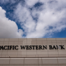 LOS ANGELES, CALIFORNIA - MAY 4: In an aerial view, a Pacific Western Bank sign is seen on May 4, 2023 in Los Angeles, California. Pacific Western Bank's stock plunged Thursday in the wake of other bank failures. Following an unusual outflow of deposits this week, PacWest Bancorp says it plans to sell a $2.7 billion loan portfolio.   David McNew/Getty Images/AFP (Photo by DAVID MCNEW / GETTY IMAGES NORTH AMERICA / Getty Images via AFP)