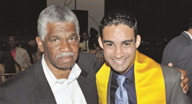 Isaac Ogando junto a Luguelin Santos.